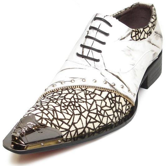 The FI-6931 White by Fiesso is a men's fashion shoe featuring a pointed toe, metallic accents, and a striking black and white patterned design. Crafted by Fiesso with a sleek leather upper, it's perfect for making a statement at any formal event.