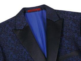 A mannequin elegantly dressed in the Alessandro Vitello by Renoir Dark Blue Slim Fit Tuxedo Blazer 290-6, featuring a floral pattern and black lapels, paired seamlessly with a crisp white dress shirt and a sophisticated blue-striped tie.