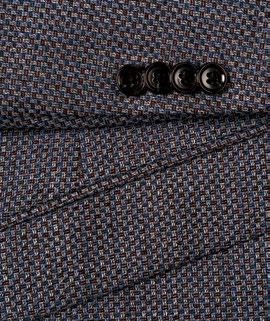 The Alessandro Vitello by Renoir Slim Fit Blazer 561-16 in dark gray, with a notch lapel, pairs elegantly with a white shirt and a blue patterned tie, featuring a matching pocket square.