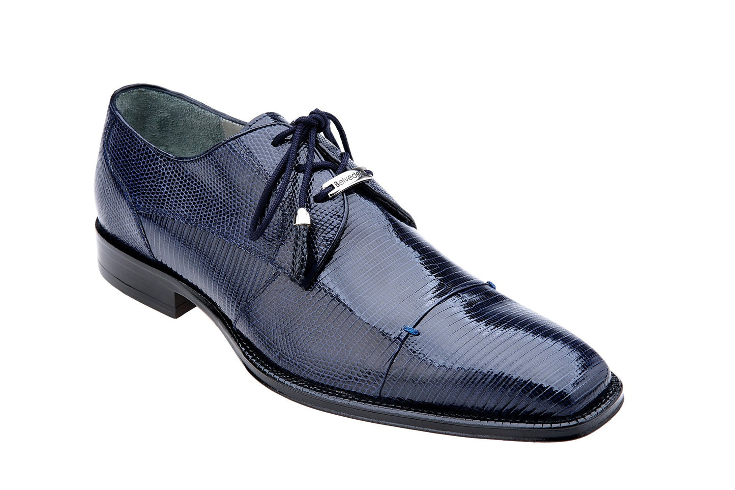 The side view of the Belvedere Karmelo, a sleek dark navy genuine lizard leather oxford shoe featuring black laces and a subtle tassel detail, is set against a white background.