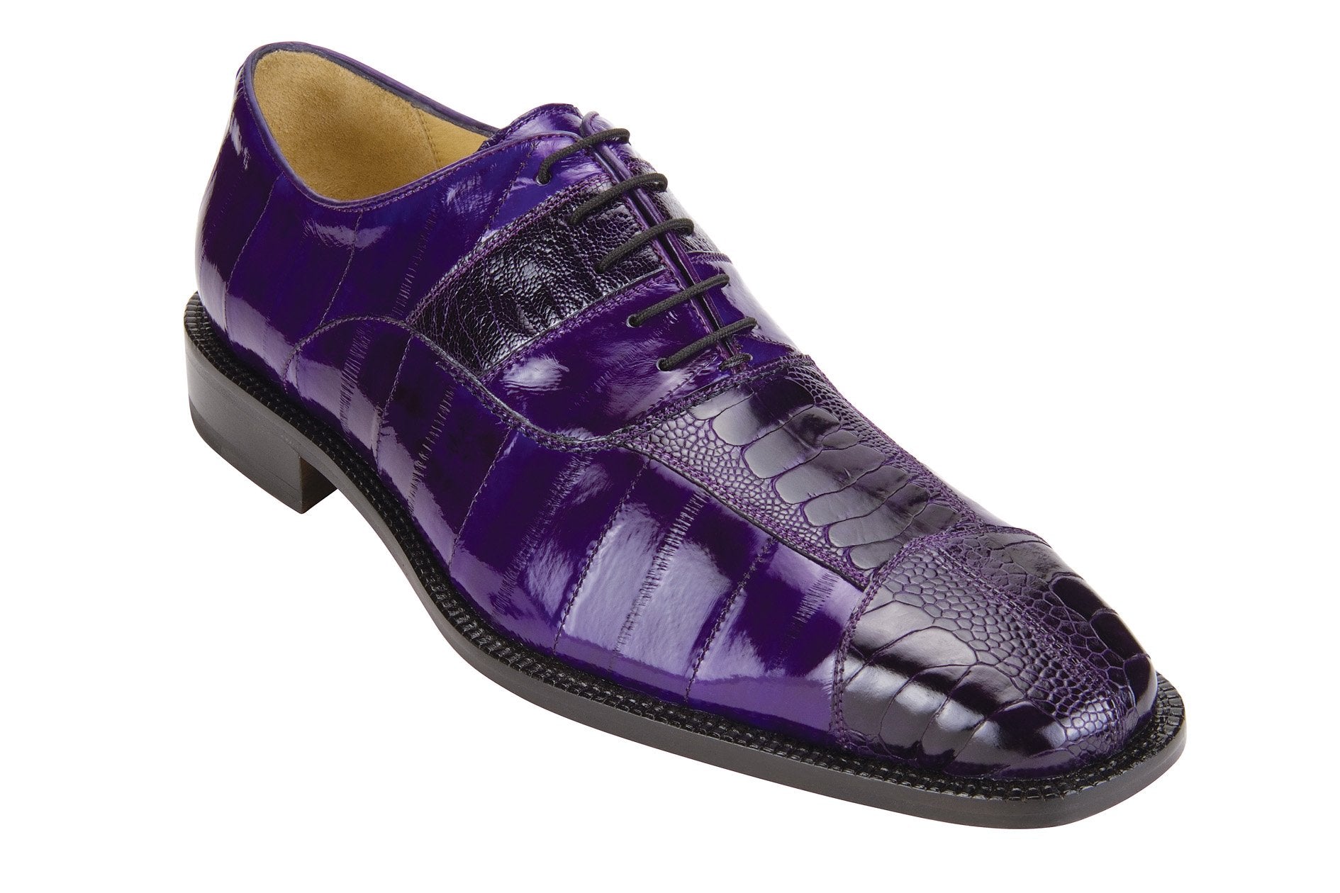 The Belvedere - Mare dress shoe in purple, crafted from luxurious genuine ostrich and eel skin, showcases a textured pattern with a sleek black sole, viewed from the side.